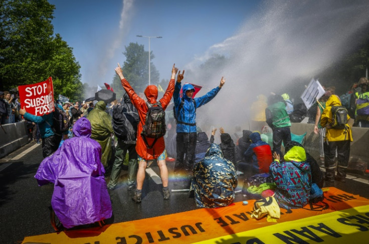 Extinction Rebellion activists blocked a section of a motorway in the centre of The Hague in protest