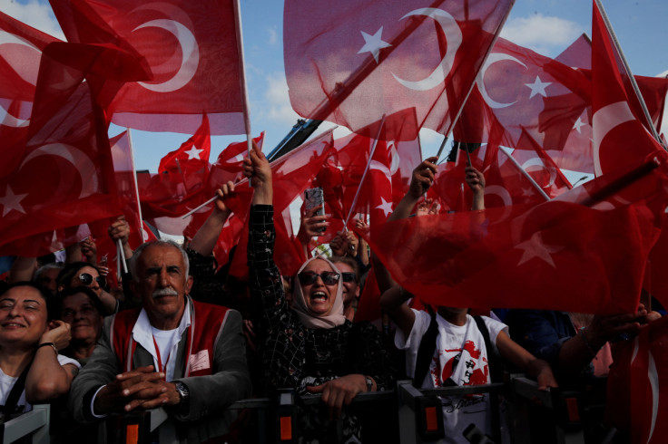 Supporters of the main opposition CHP wave flags during an election rally in Istanbul