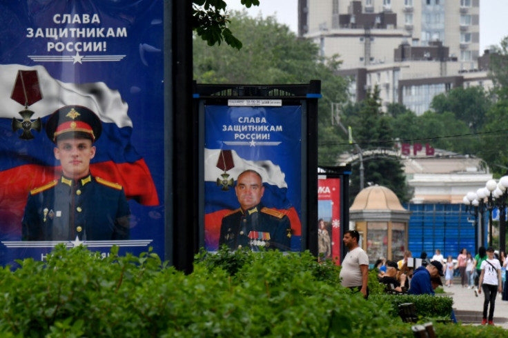 Alongside army recruitment posters, pictures have been put up around the of city of "Heroes of Russia", soldiers killed in combat in Ukraine