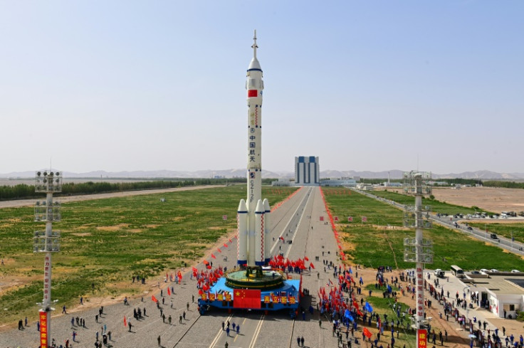 The Long March-2F rocket carrying the Shenzhou-16 spacecraft and China's first civilian astronaut is due to blast off at 0131 GMT Tuesday