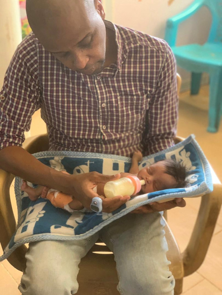 Dr. Kenany feeds newborn baby in Khartoum