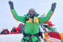 Kami Rita Sherpa is pictured on the summit of Mount Everest during his 28th summit in Everest