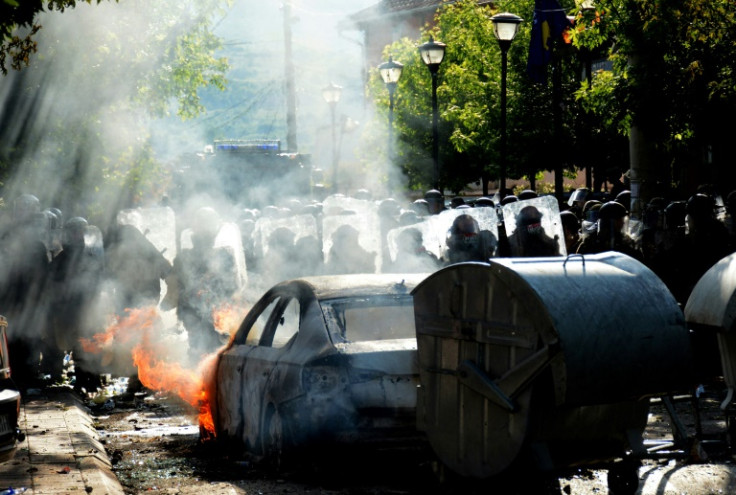 Riot police and KFOR peacekeepers clash with ethnic Serbs is Zvecan, Kosovo, Monday