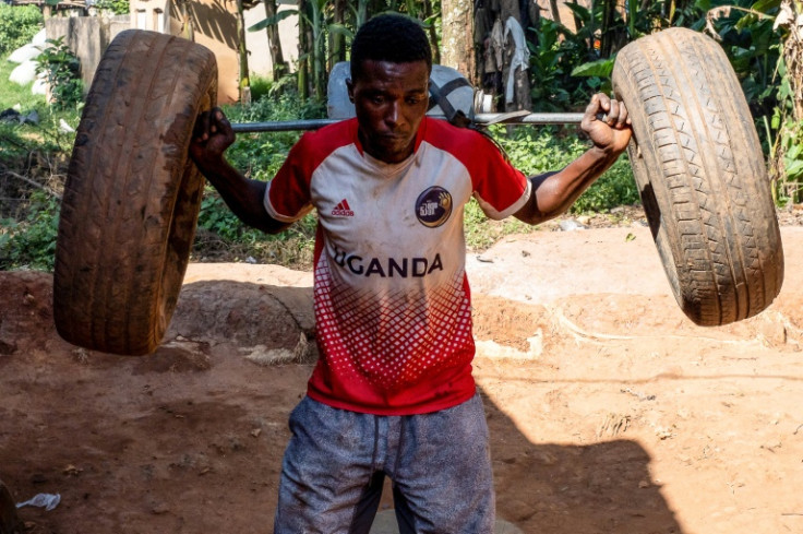 Kasumba uses car tyres and plastic bottles filled with water for his weight training