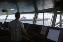 Crew from the support vessel Ndeavor spy the abandoned oil tanker FSO Safer near the coast of Yemen in a handout photo from Dutch company Boskalis