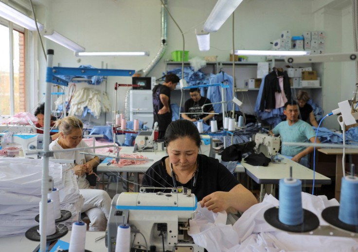 A seamstress works at a sewing workshop in Moscow