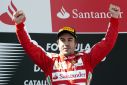 Remember me? Fernando Alonso celebrates victory at the 2013 Spanish Grand Prix in his Ferrari days