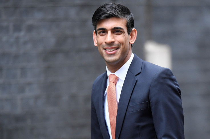 Rishi Sunak arrives at Downing Street in London