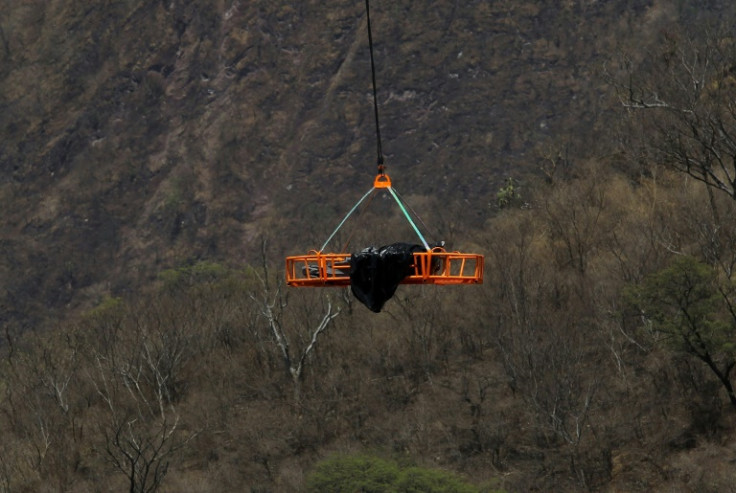 A helicopter was used to take the bags of human remains from the ravine in Zapopan, Jalisco State