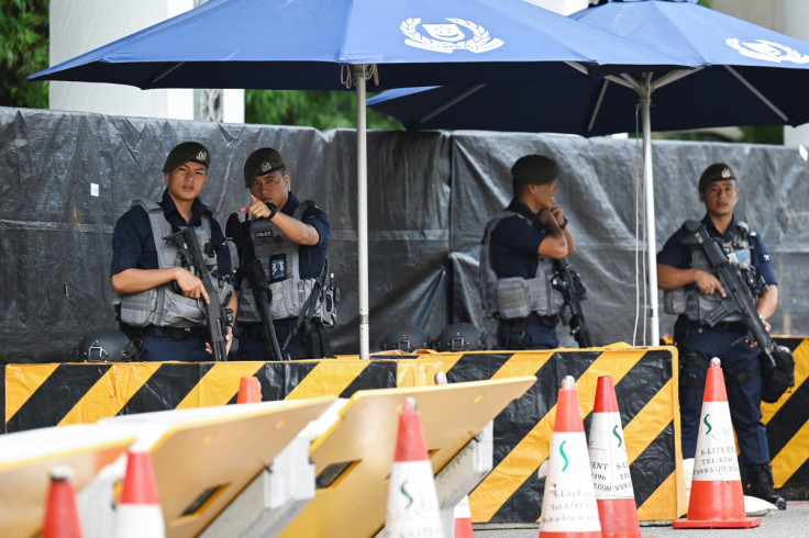 Gurkhas stand guard at the entrance of the venue of the 20th Shangri-La Dialogue in Singapore