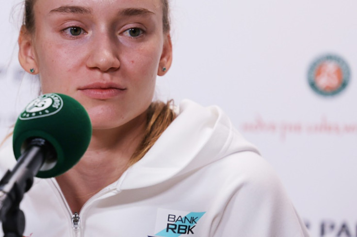 Fever: Elena Rybakina addresses a press conference at Roland Garros on Saturday where she withdrew from the tournament