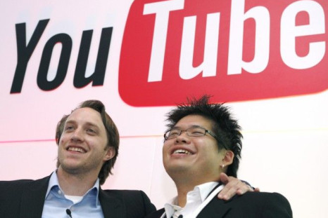 Chad Hurley and Steve Chen, co-founders of YouTube, pose after a news conference