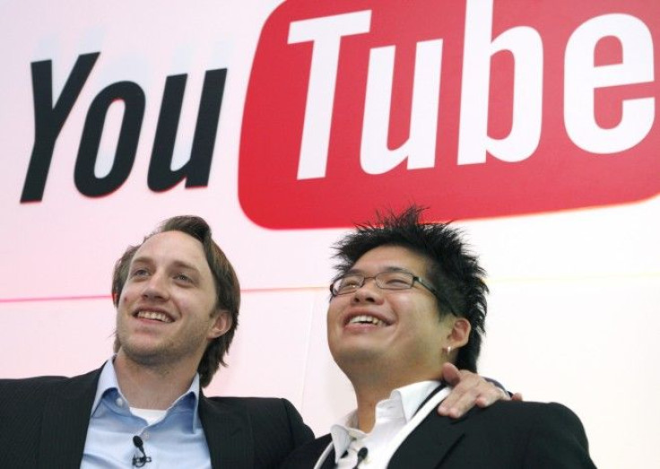 Chad Hurley and Steve Chen, co-founders of YouTube, pose after a news conference