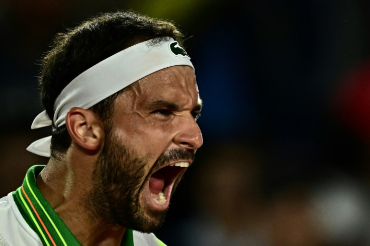 Time running out? Grigor Dimitrov celebrates his victory over Daniel Altmaier in the third round