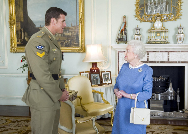 Britain's Queen Elizabeth II greets Australian SAS Corporal Ben Roberts-Smith, who was recently awarded the VC, during an audience at Buckingham Palace in London