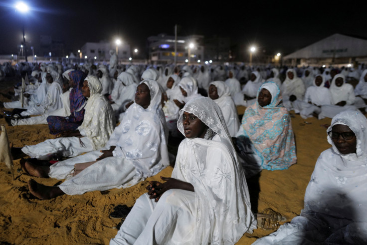 Senegalese Muslims from the Layene Brotherhood, a religious sect of Sufi Muslims  gather to pray  for peace and stability
