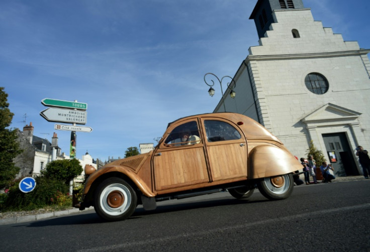 Robillard drove his wooden 2CV through the streets of Loches, central France, in 2017