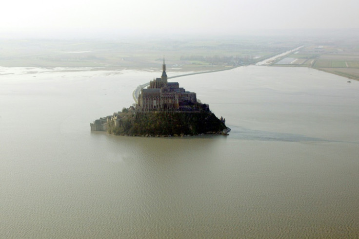 The Mont Saint-Michel abbey is surrounded by sea between 50 to 90 times a year, particularly during high tides