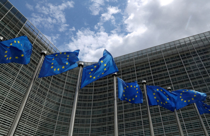 European Union flags flutter outside the European Commission headquarters in Brussels