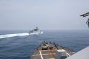 Chinese warship sails near U.S. destroyer, in the Taiwan Strait