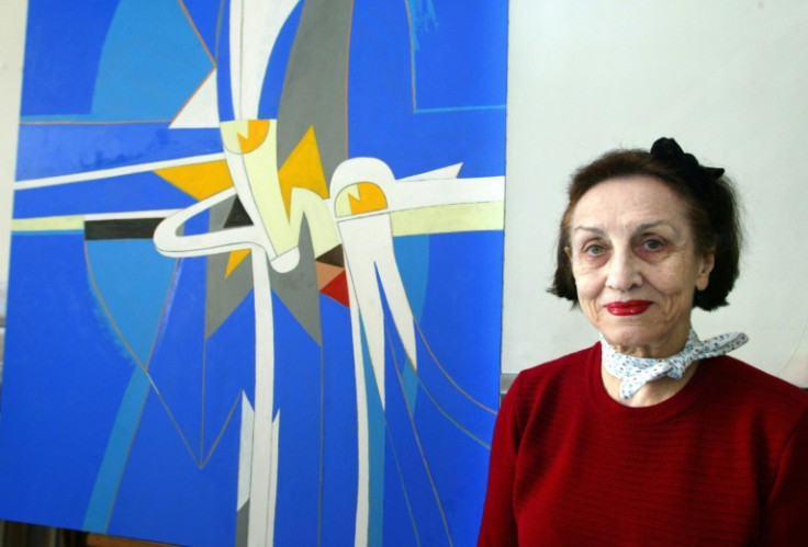 French painter Francoise Gilot poses in April 2004 in her workshop in Paris