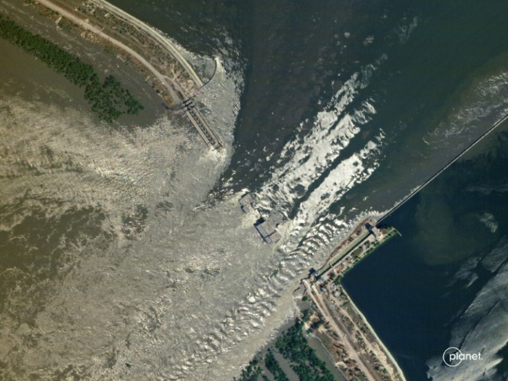 Water flowing through the damaged Kakhovka dam in southern Ukraine