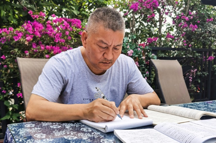 Self-made millionaire Liang Shi, 56, has stubbornly sat for China's tough university entrance exam 26 times before