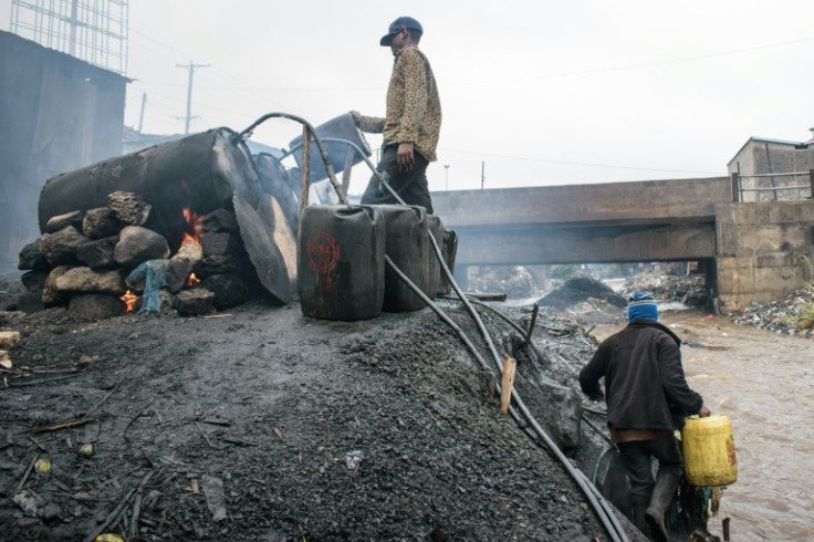 In the Nairobi slum of Mathare, people use oil drums to distil chang’aa, a powerful and illicit alcohol