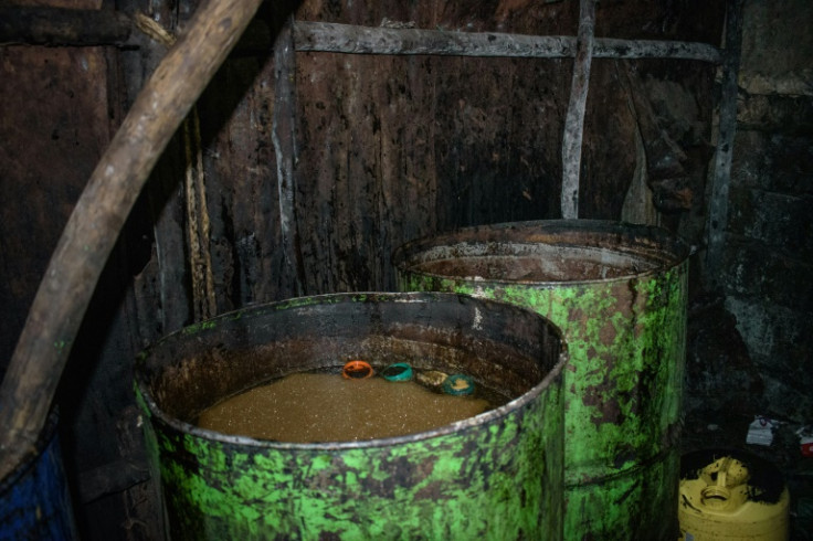 Water and molasses are key ingredients in making chang'aa. After fermentation, the mix is distilled by boiling over a fire, with a pan of cool water to create condensation