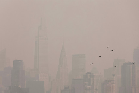 The Manhattan skyline is covered in haze and smoke caused by a wildfire in Canada, in New York