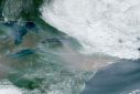 This National Oceanic and Atmospheric Administration (NOAA) satellite handout image shows smoke (C) from Canada's wildfires over the the US East Coast,  on June 7, 2023