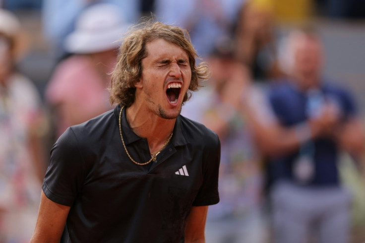 Roar of delight: Germany's Alexander Zverev shouts as he celebrates his victory over Argentina's Tomas Martin Etcheverry