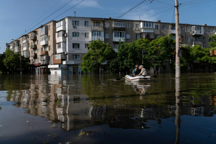An attack on a major Russian-held dam unleashed a torrent of water