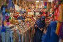 Women shop for jewellery at a market in Peshawar on June 8, a day before Pakistan releases its budget