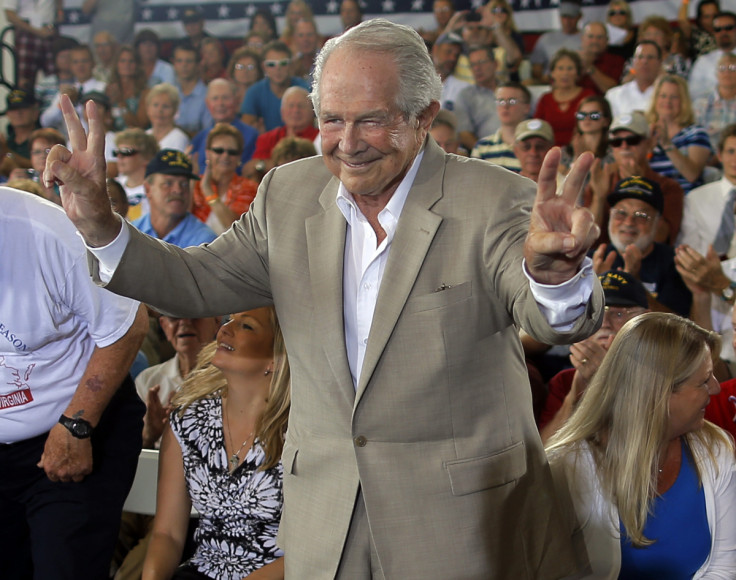 Evangelical Christian leader Pat Robertson takes his seat onstage ahead of a campaign rally with Republican presidential candidate and former Massachusetts Governor Mitt Romney in Virginia Beach