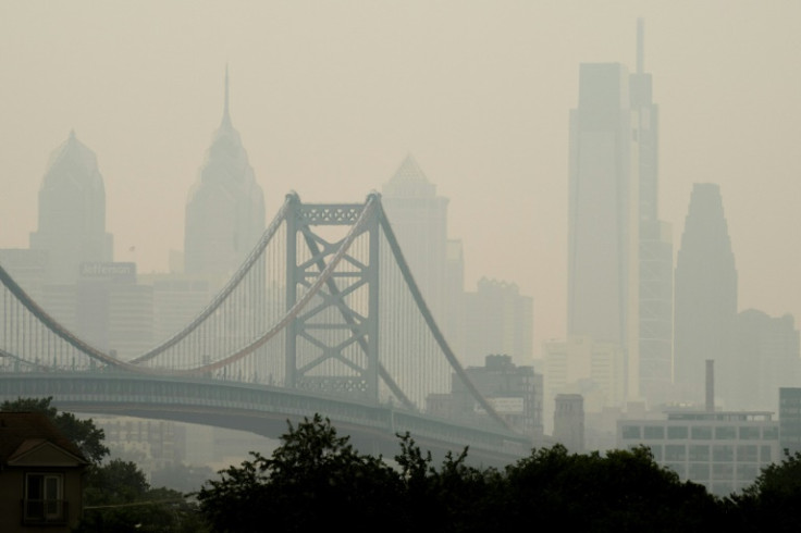 Smoke from Canada's wildfires casts a haze over the Philadelphia skyline, as seen from Camden, New Jersey