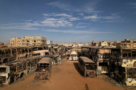 Burnt-out buses which belong to a partly state-funded "Dem Dikk" company are seen in Dakar