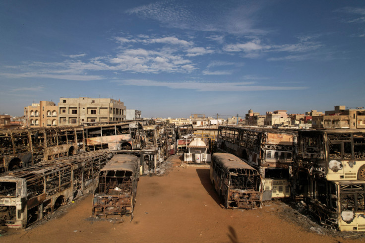 Burnt-out buses which belong to a partly state-funded "Dem Dikk" company are seen in Dakar