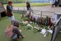 Tribute for victims the day after knife attack in French alpine town of Annecy