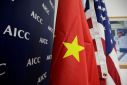Flags of U.S. and China are displayed at AICC's booth during China International Fair for Trade in Services in Beijing
