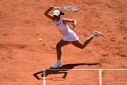 Iga Swiatek outlasted Karolina Muchova to win her third French Open title