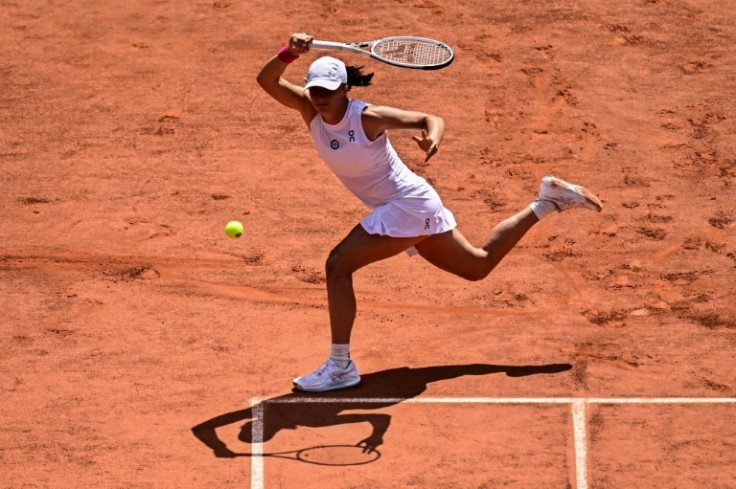 Iga Swiatek outlasted Karolina Muchova to win her third French Open title