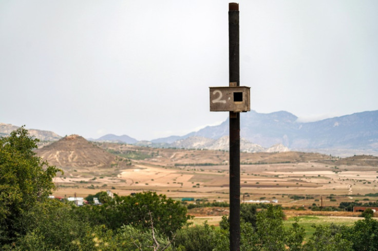 Around 50 light wooden boxes have been installed on tree trunks as part of an initiative to encourage farmers to abandon using poison