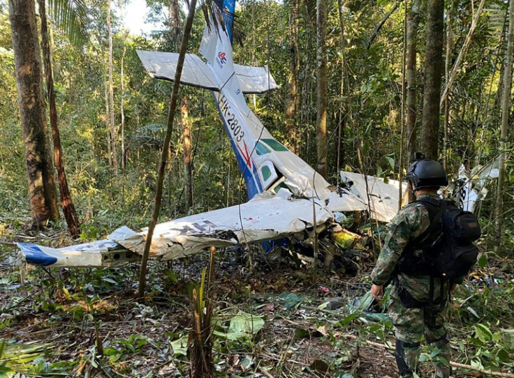 The Colombian Army discovered the plane wreck lying near vertical amid dense jungle
