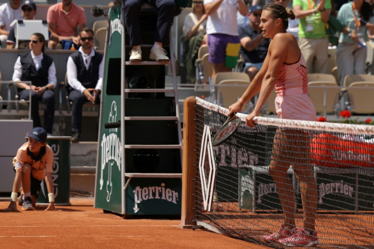 Waiting game: Belarus' Aryna Sabalenka waits to shake hands with Ukraine's Elina Svitolina