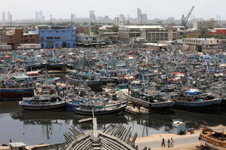 Anchored fishing boats, seen following the cyclonic storm, Biparjoy, over the Arabian Sea, at Fish Harbour, in Karachi