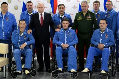 Russian President Vladimir Putin visited injured soldiers in a Moscow hospital