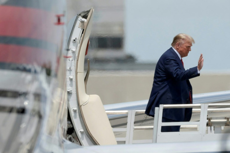 Donald Trump arrives at Miami International Airport on June 12, 2023