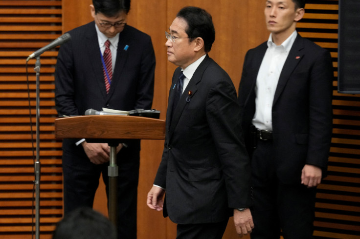 Japanese Prime Minister Fumio Kishida arrives for a news conference at the prime minister's office in Tokyo