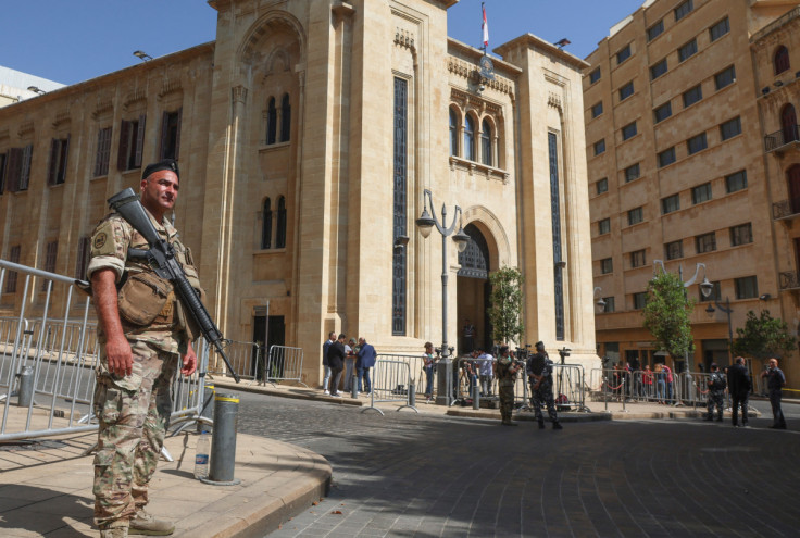 A member of the Lebanese army stands guard as Lebanon's parliament is set to convene in a bid to elect a head of state to fill the vacant presidency, in downtown Beirut